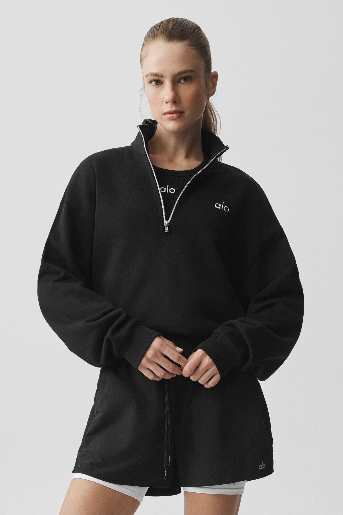 Sweat à col montant et demi-zip