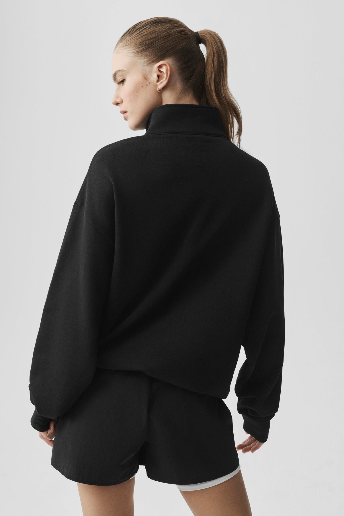 Sweat à col montant et demi-zip