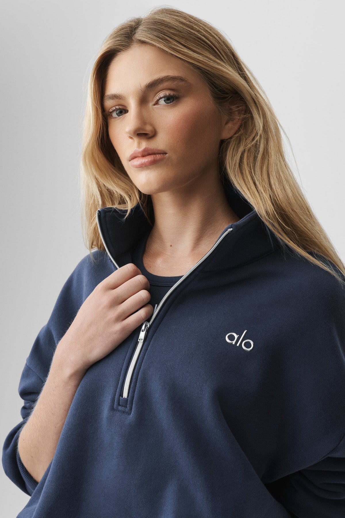 Sweat à col montant et demi-zip