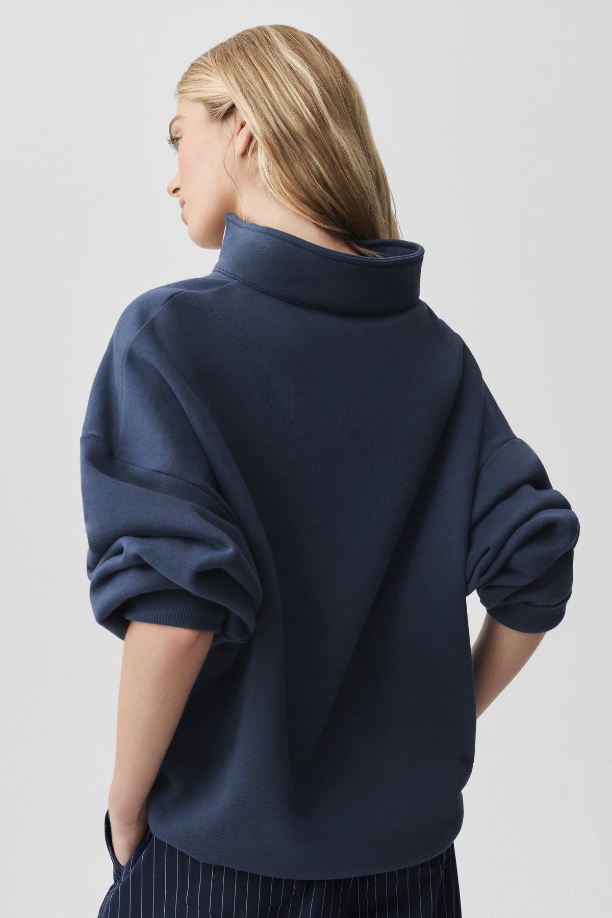 Sweat à col montant et demi-zip
