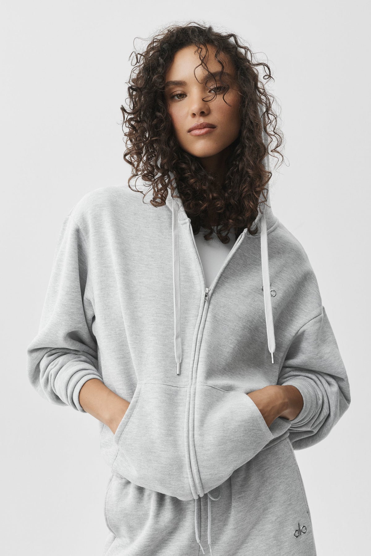 Sweat à capuche zippé à poches
