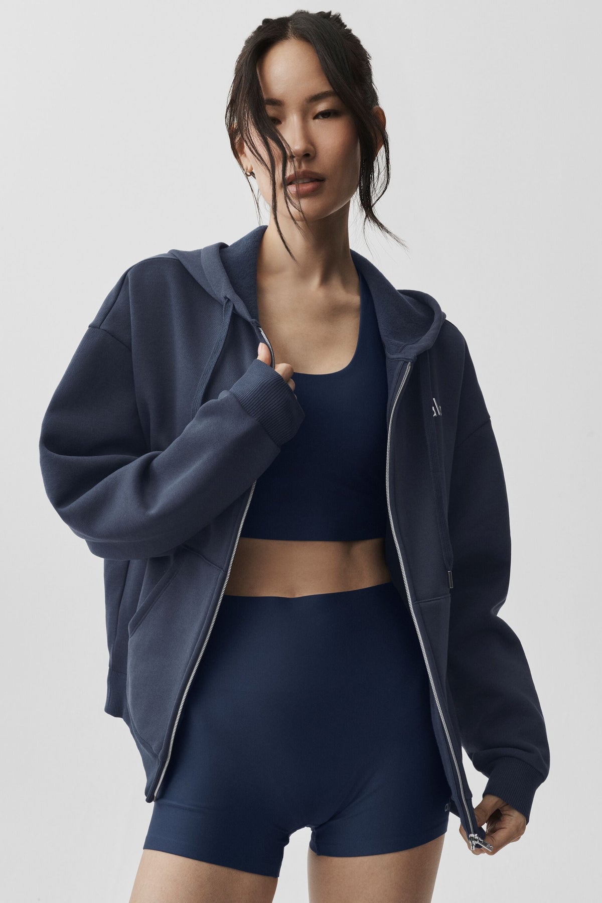 Sweat à capuche zippé à poches