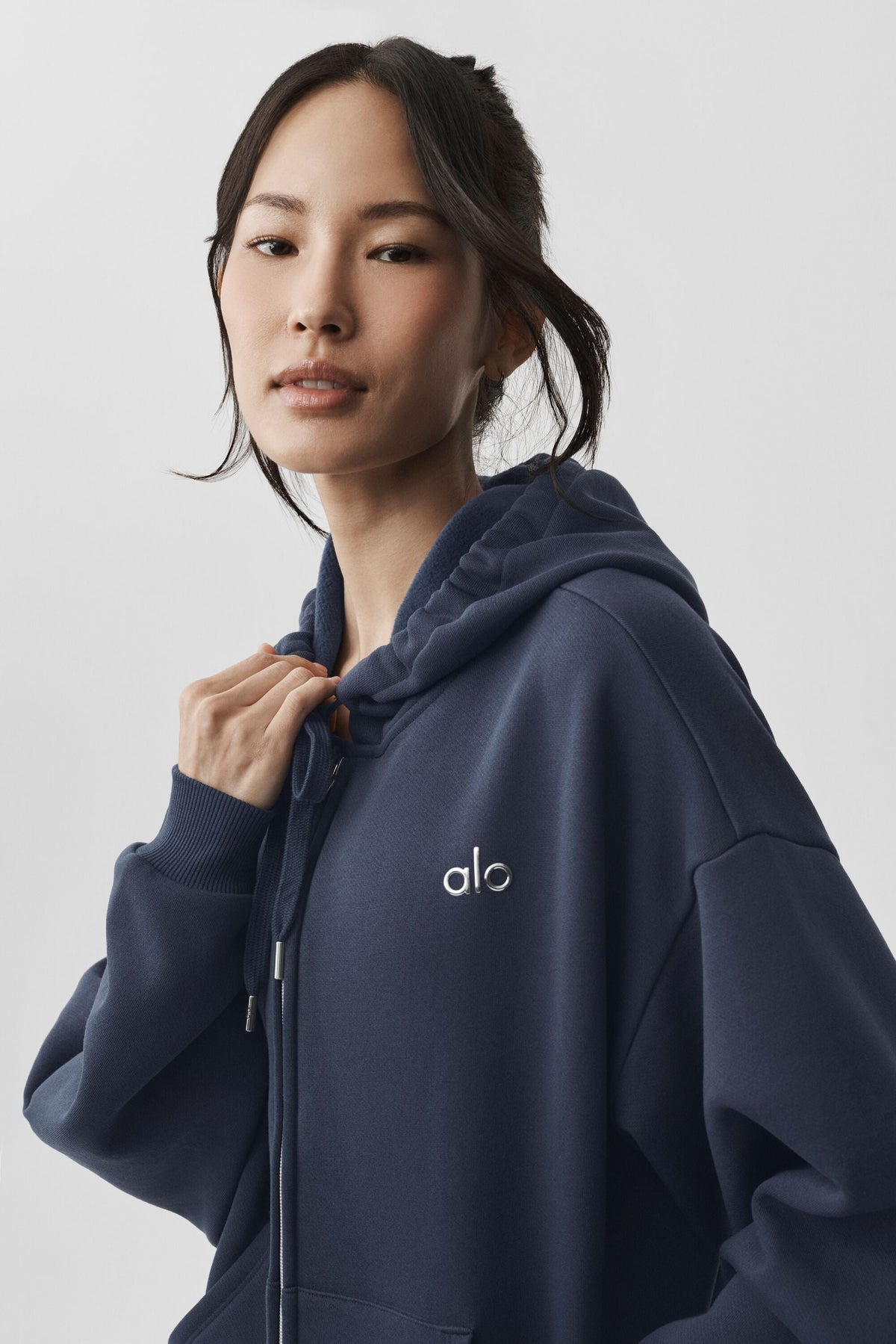 Sweat à capuche zippé à poches