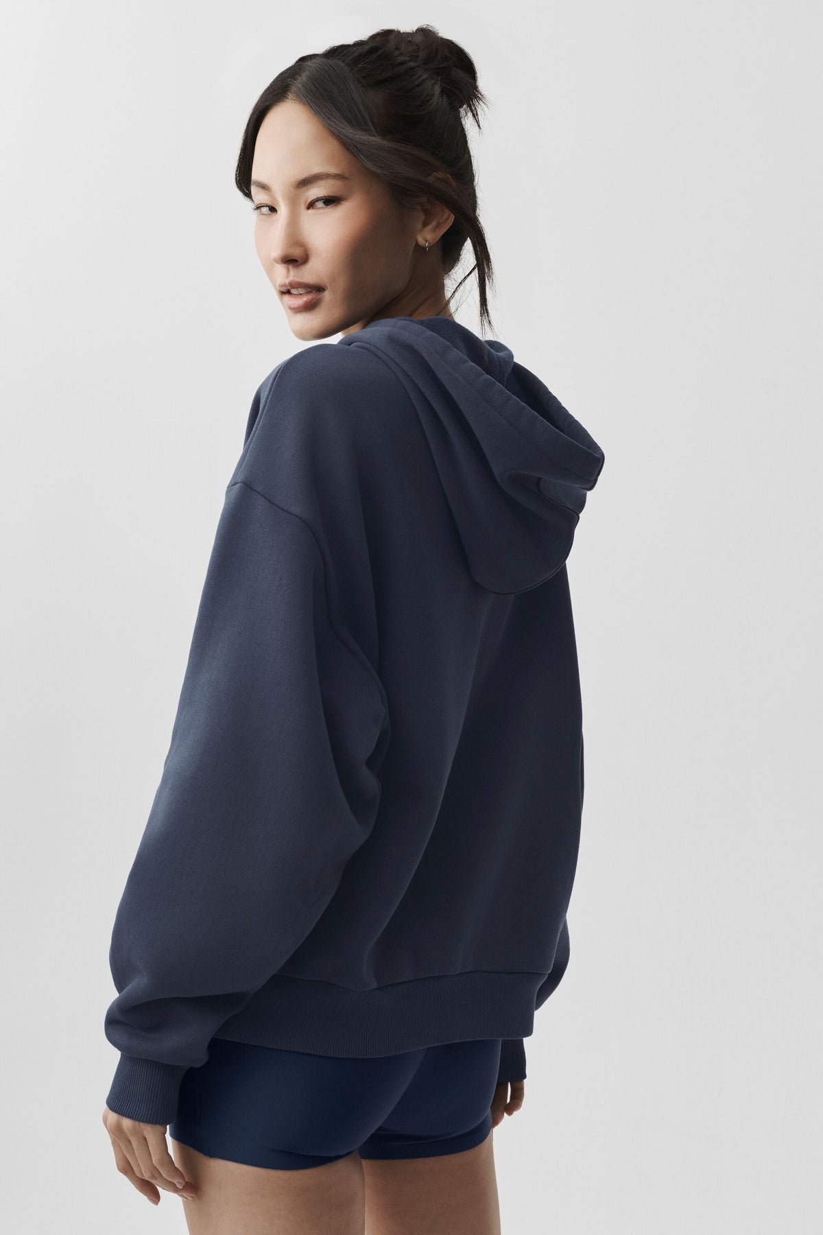 Sweat à capuche zippé à poches