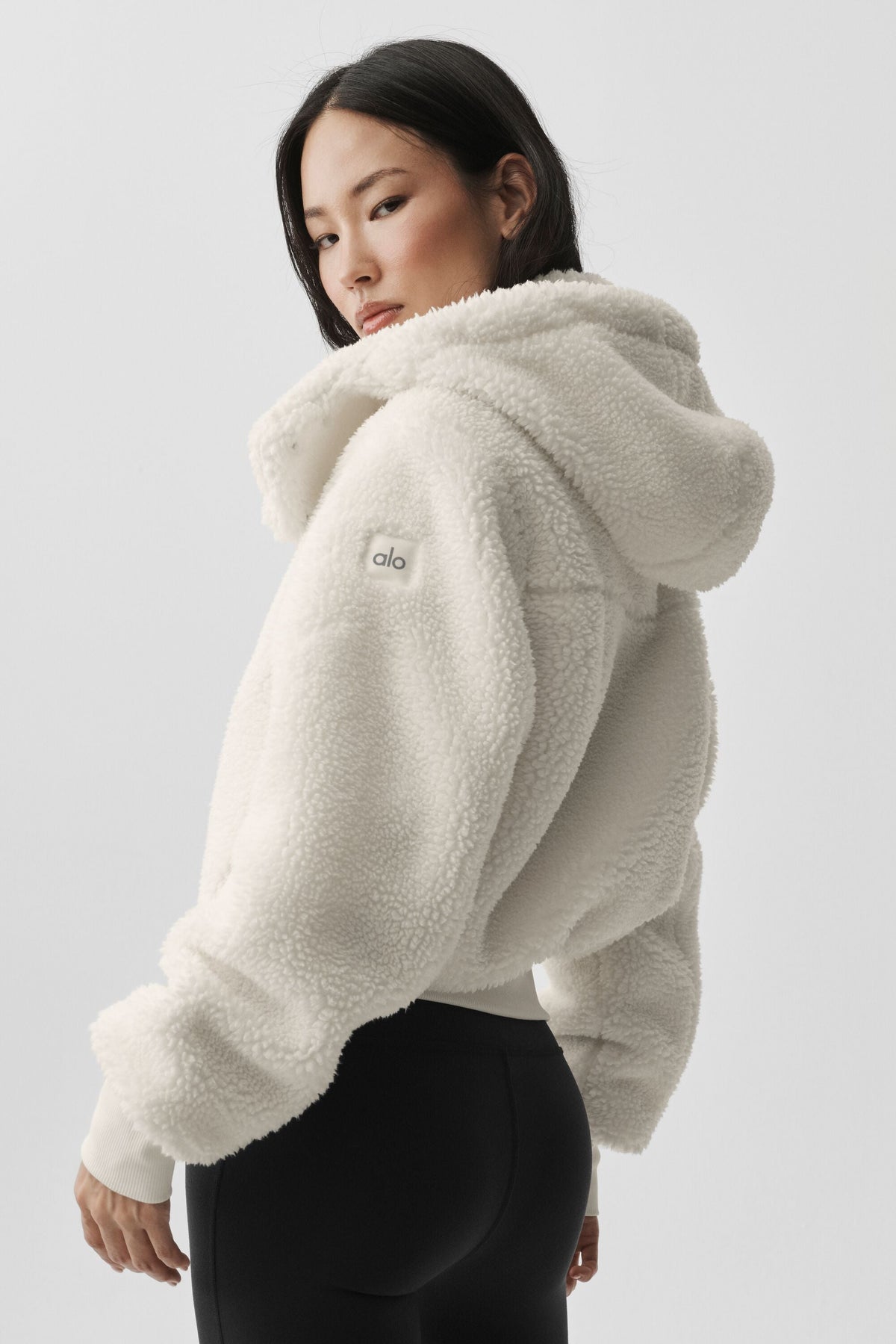 Veste à capuche effet peluche