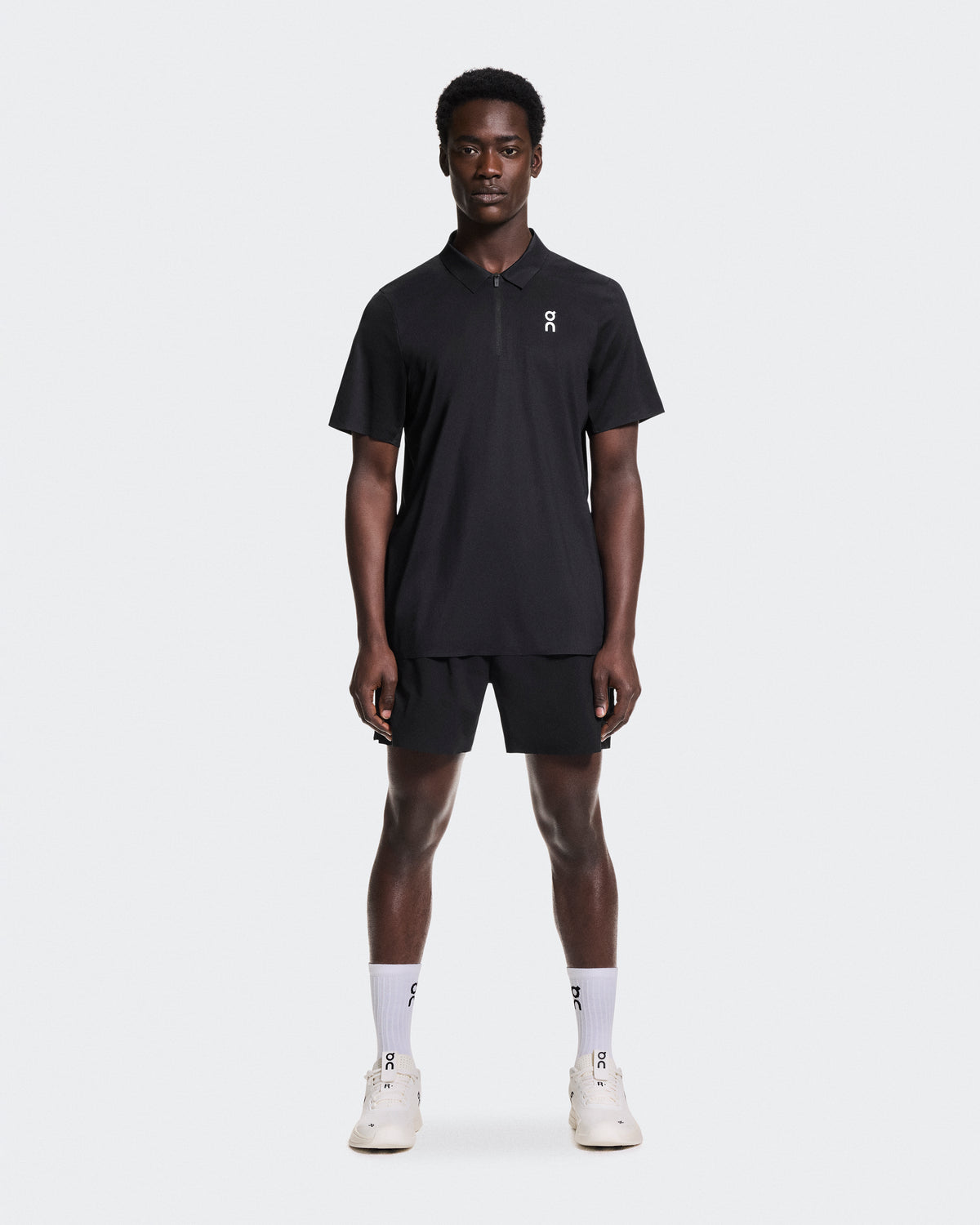 Court Polo coloris Noir – vue 1